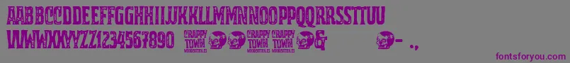 Crappy Town-Schriftart – Violette Schriften auf grauem Hintergrund