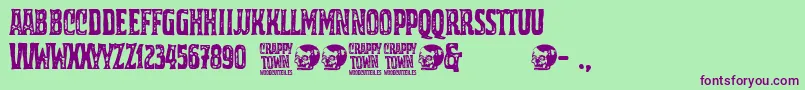 Czcionka Crappy Town – fioletowe czcionki na zielonym tle