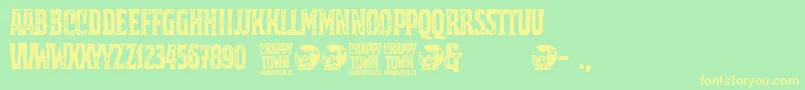 Crappy Town Font – Yellow Fonts on Green Background