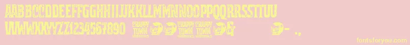 フォントCrappy Town – 黄色のフォント、ピンクの背景