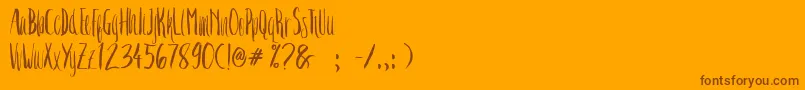 Crash One-Schriftart – Braune Schriften auf orangefarbenem Hintergrund