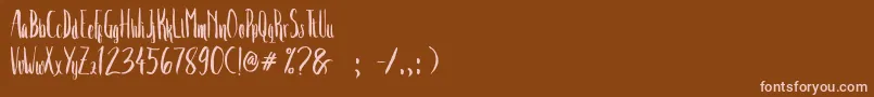 フォントCrash Two – 茶色の背景にピンクのフォント