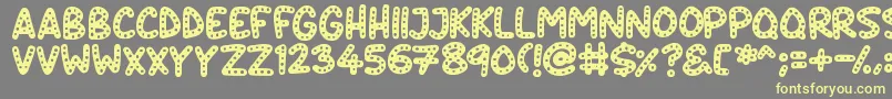 Crazy Dots Font – Yellow Fonts on Gray Background
