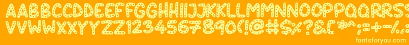 Crazy Dots Font – Yellow Fonts on Orange Background