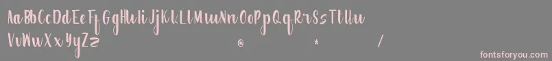 Creative Word Free Version Font – Pink Fonts on Gray Background
