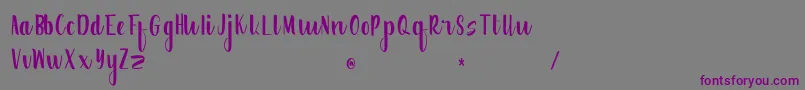 Creative Word Free Version Font – Purple Fonts on Gray Background