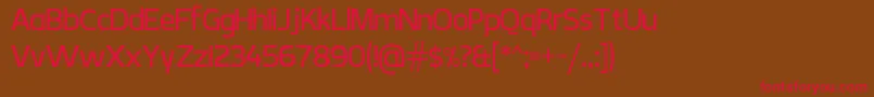 フォントCreativZoo V 7 – 赤い文字が茶色の背景にあります。