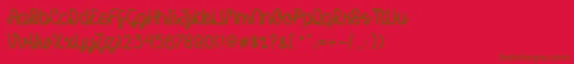 Creatoon-fontti – ruskeat fontit punaisella taustalla