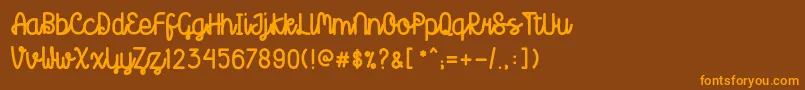 Creatoon Font – Orange Fonts on Brown Background