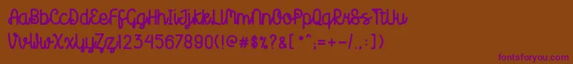 Шрифт Creatoon – фиолетовые шрифты на коричневом фоне