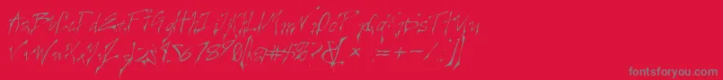 CREELO  -fontti – harmaat kirjasimet punaisella taustalla