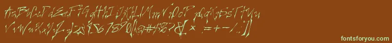 フォントCREELO   – 緑色の文字が茶色の背景にあります。