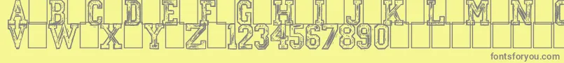 フォントMickeysCollege – 黄色の背景に灰色の文字