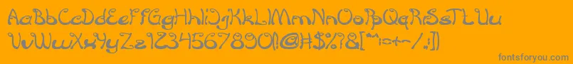 croissant sandwich bold-Schriftart – Graue Schriften auf orangefarbenem Hintergrund