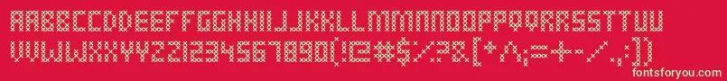 fuente CrossStitched – Fuentes Verdes Sobre Fondo Rojo