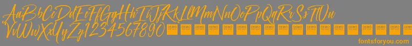 フォントCrown Heights   Demo – オレンジの文字は灰色の背景にあります。