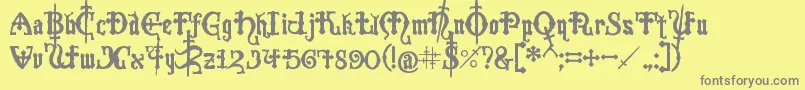 フォントCrusades – 黄色の背景に灰色の文字