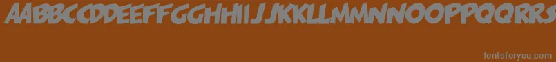 PagiJakarta-fontti – harmaat kirjasimet ruskealla taustalla