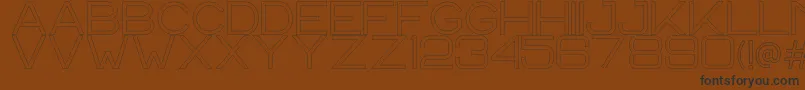 CS Harley Outline-Schriftart – Schwarze Schriften auf braunem Hintergrund