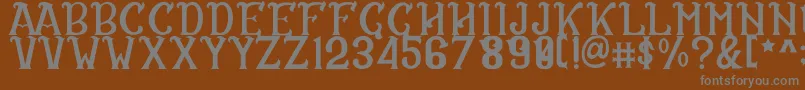CS Rosalia Regular Font – Gray Fonts on Brown Background