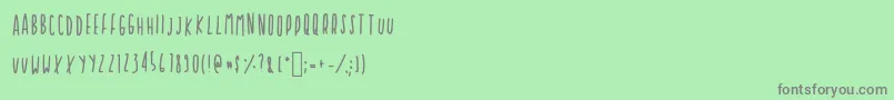 Cupcakie-Schriftart – Graue Schriften auf grünem Hintergrund