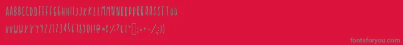 Cupcakie-fontti – harmaat kirjasimet punaisella taustalla