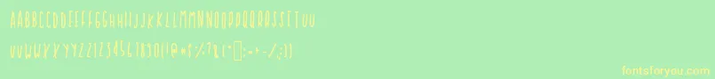 Cupcakie Font – Yellow Fonts on Green Background