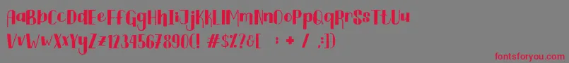 Czcionka Curtina Font – czerwone czcionki na szarym tle