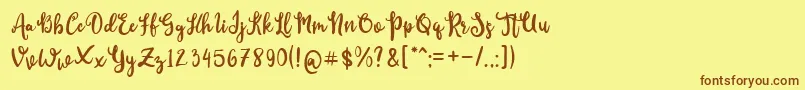 CutieDay-Schriftart – Braune Schriften auf gelbem Hintergrund