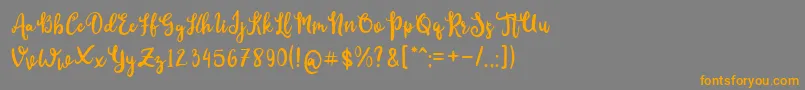 CutieDay Font – Orange Fonts on Gray Background