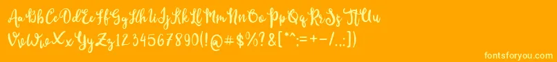 Fonte CutieDay – fontes amarelas em um fundo laranja
