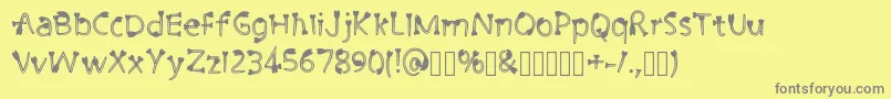 CutiePie3 Regular-fontti – harmaat kirjasimet keltaisella taustalla