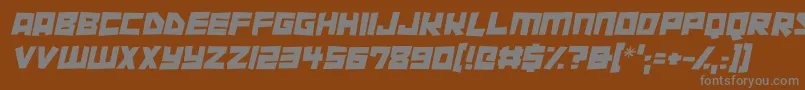 Cutout City Italic-fontti – harmaat kirjasimet ruskealla taustalla