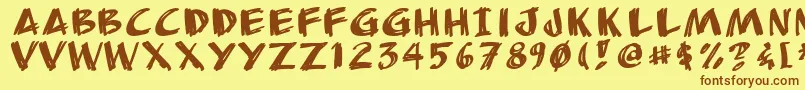 フォントAnudaw – 茶色の文字が黄色の背景にあります。