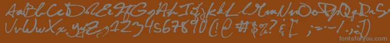 CuttyFruty Font – Gray Fonts on Brown Background