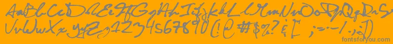 CuttyFruty-Schriftart – Graue Schriften auf orangefarbenem Hintergrund