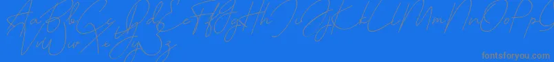 cutyle mono line-Schriftart – Graue Schriften auf blauem Hintergrund