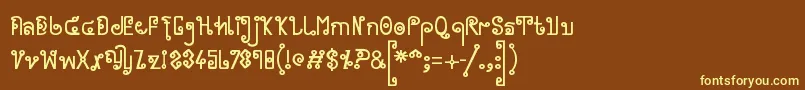Cyclin  -fontti – keltaiset fontit ruskealla taustalla