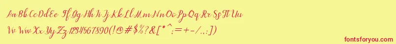Czcionka dahlia script Italic – czerwone czcionki na żółtym tle