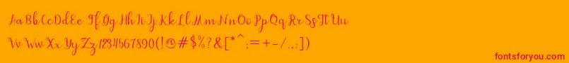 Czcionka dahlia script – czerwone czcionki na pomarańczowym tle