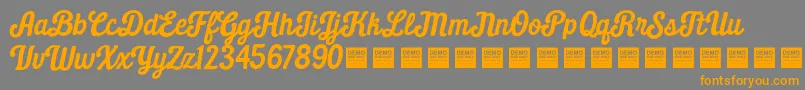 Daily Grind   Demo-Schriftart – Orangefarbene Schriften auf grauem Hintergrund