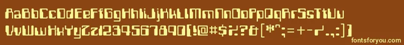 Computerfont-fontti – keltaiset fontit ruskealla taustalla