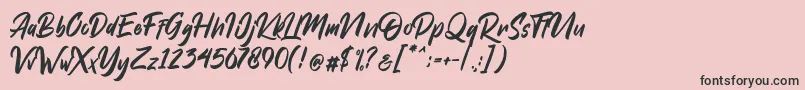 フォントDakwart Letter – ピンクの背景に黒い文字