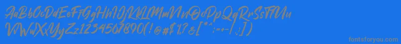 Dakwart Letter-fontti – harmaat kirjasimet sinisellä taustalla