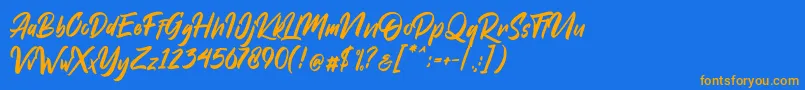 フォントDakwart Letter – オレンジ色の文字が青い背景にあります。