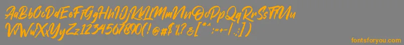 DakwartLetter Font – Orange Fonts on Gray Background