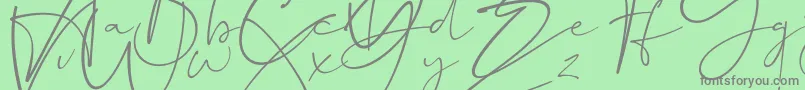 Fonte Dalmatins – fontes cinzas em um fundo verde