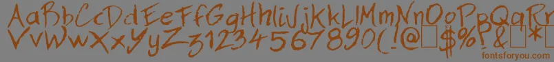 Dan Hand Font – Brown Fonts on Gray Background