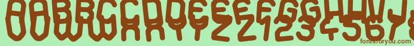 Dancing Days Font – Brown Fonts on Green Background