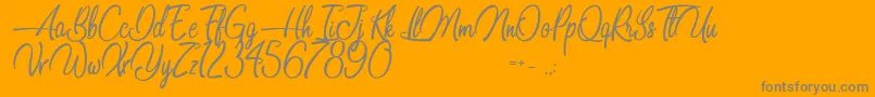 Dancing in the Beat-Schriftart – Graue Schriften auf orangefarbenem Hintergrund